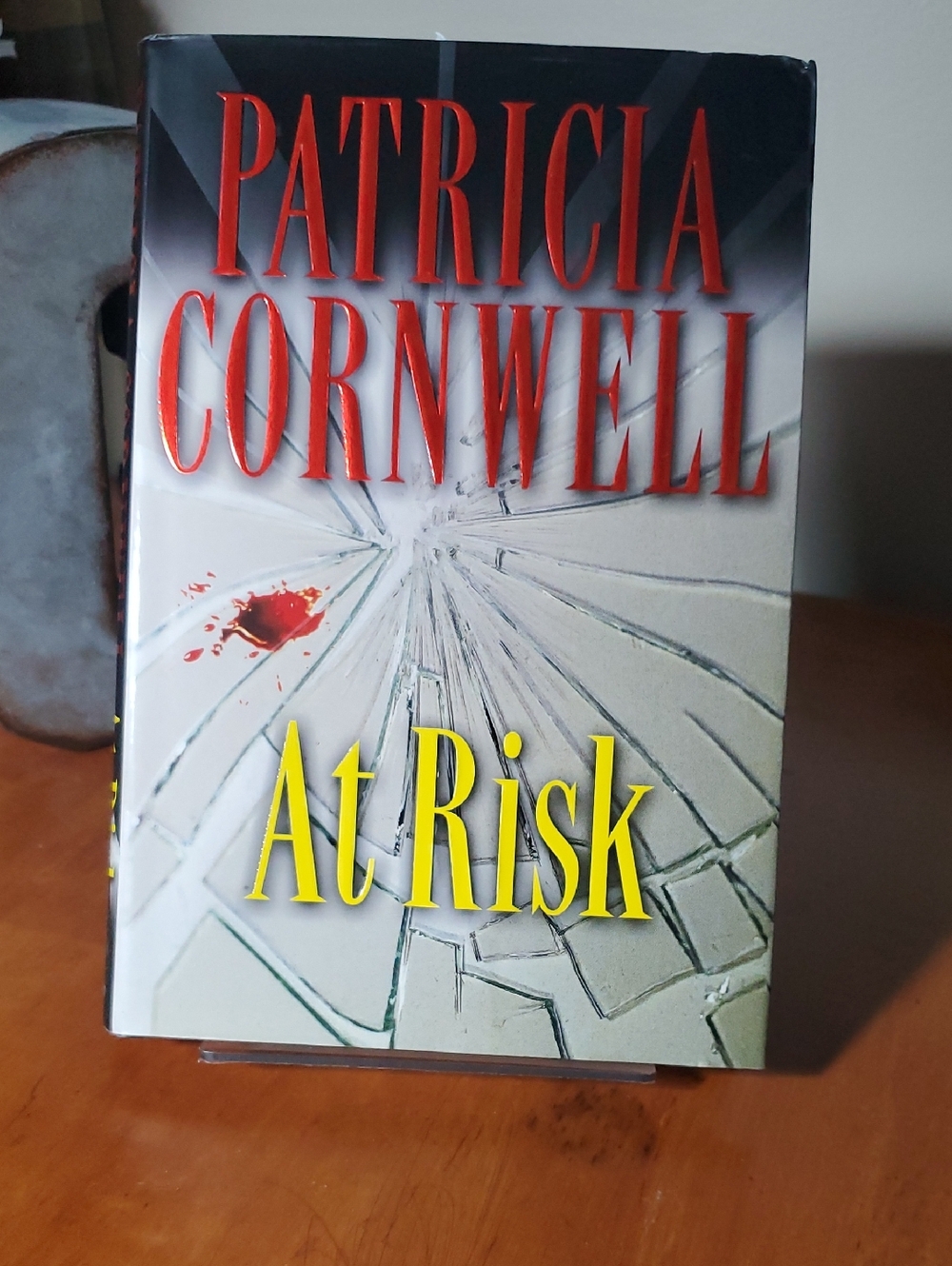 Patricia Cornwell "At Risk" Hardcover — Red, Yellow, White Cover